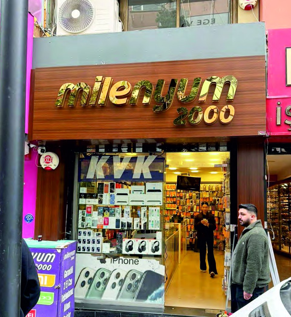 Milenyum 2000 mağazası Karşıyaka Çarşı standardına uygun ışıklı kutu harf tabela